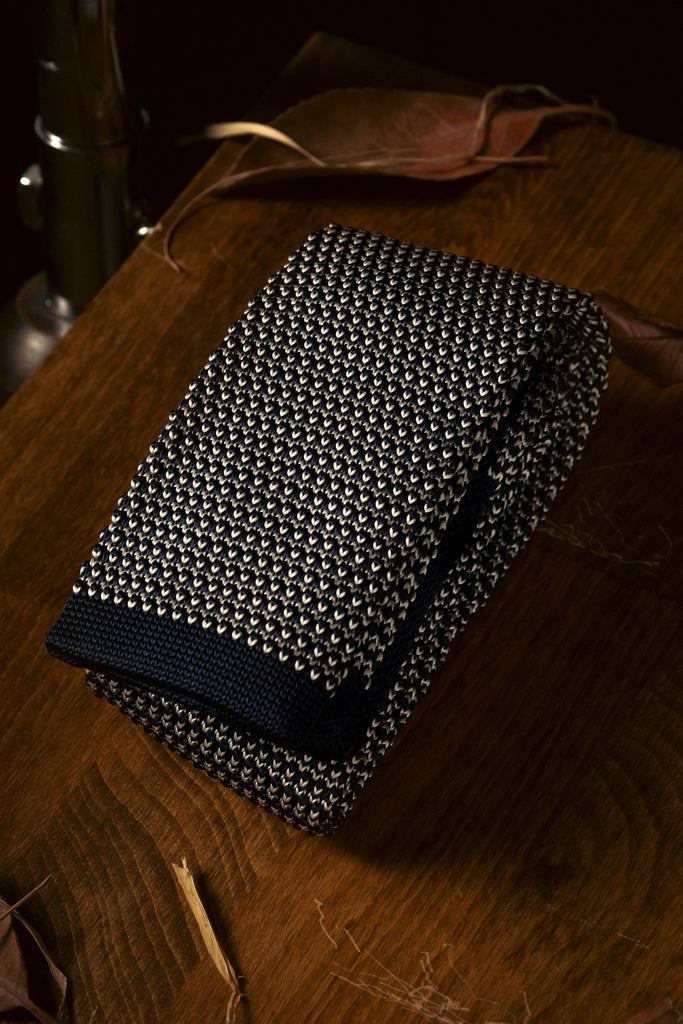 Knitted Tie: Navy & White Patterned Knit Tie - Jack Martin